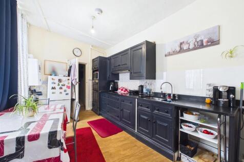 House arranged as two flats for auction, Totterdow