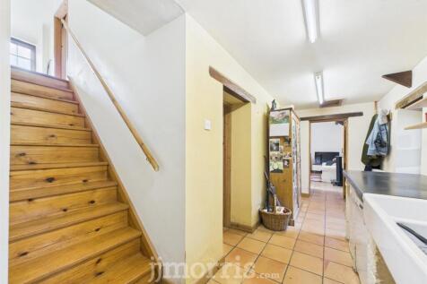 Hardwood Entrance Door to:-