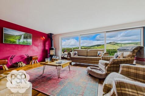 Snug Lounge with Stunning Views and Log Burner