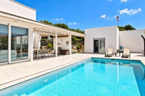 Designer villa with sea views in Binibeca