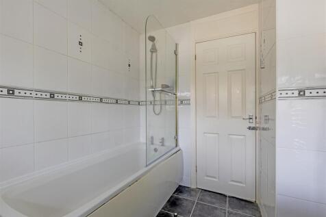 Fully Tiled Family Bathroom