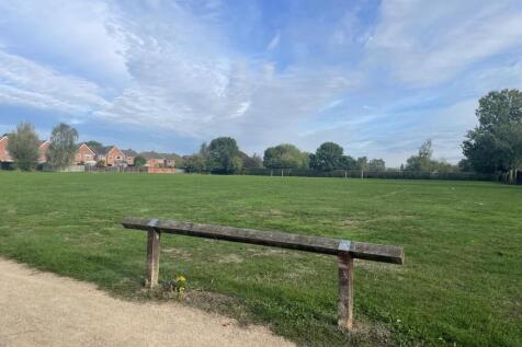 Public green space at rear