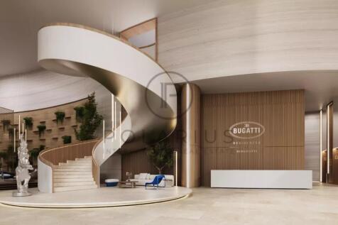 The image shows a luxurious interior with a grand 