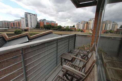 Private balcony with scenic waterfront views...