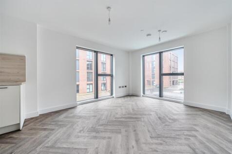 Bright living room with stylish parquet floorin...