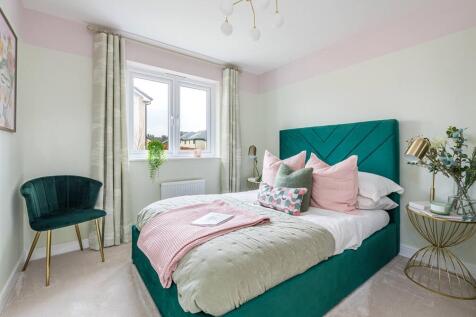 Bedroom two enjoys views of the rear garden