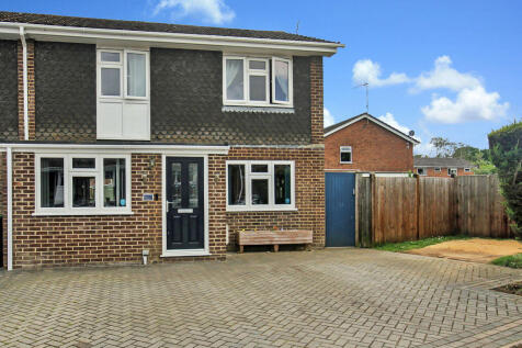 Front of property with generous driveway