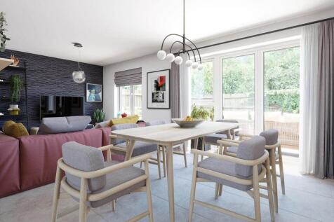 Double doors lead from the dining area to the garden, perfect for alfresco dining