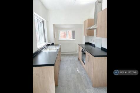 Newly Fitted Kitchen With Electric Oven And Hob 