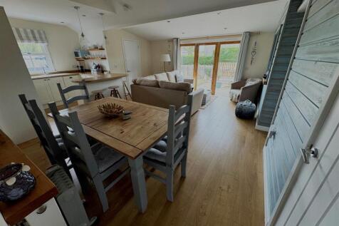 LIVING AREA, SITTING, DINING AND KITCHEN