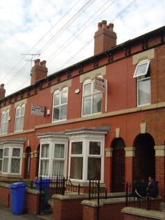Exterior view of a charming terraced house with...