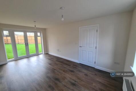 Lounge With Double French Doors Access To Garden