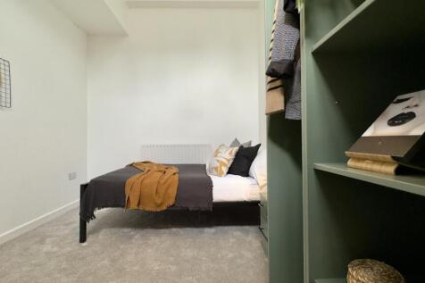 A stylish and inviting double bedroom featuring...