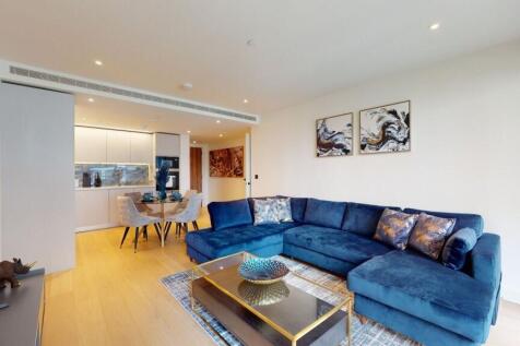 Bright lounge with stylish blue corner sofa...