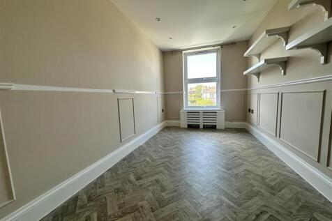 Elegant room with stylish parquet flooring...