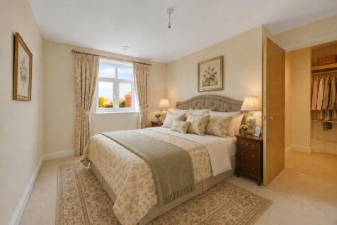 a bedroom with a large bed