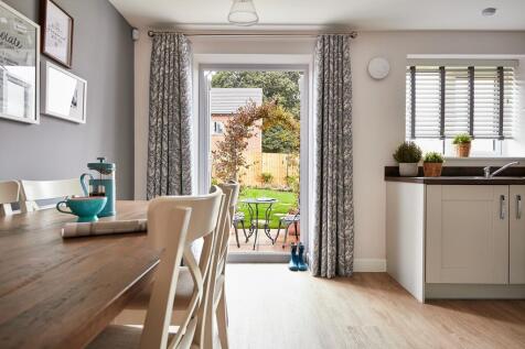 A welcoming hub for family life, with French doors leading straight into the garden