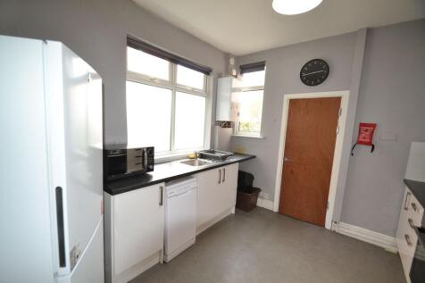 Bright and functional kitchen area featuring a ...