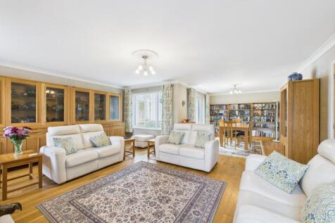 open plan lounge &amp; dining room