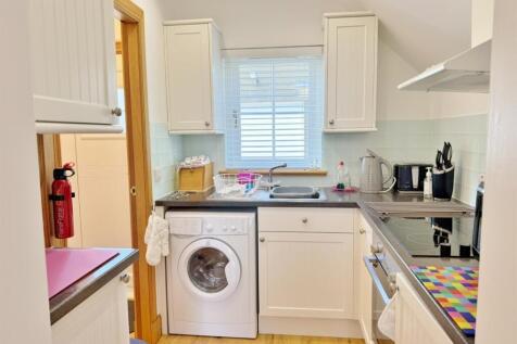 Little Wellingtonia kitchen from lounge area