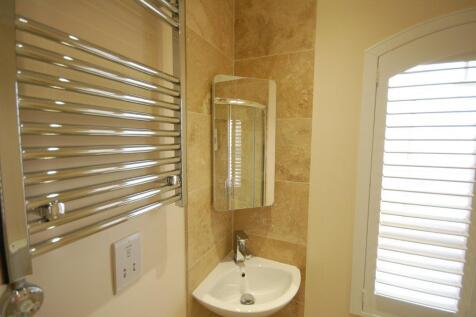 Shower Room- towel rail and sink