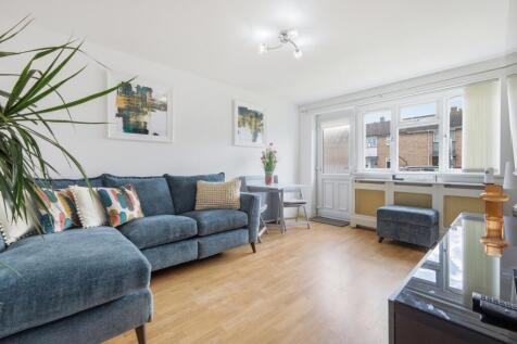 Lounge/Dining Room with door leading to the rear a