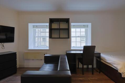 Studio with living, study and sleeping areas
