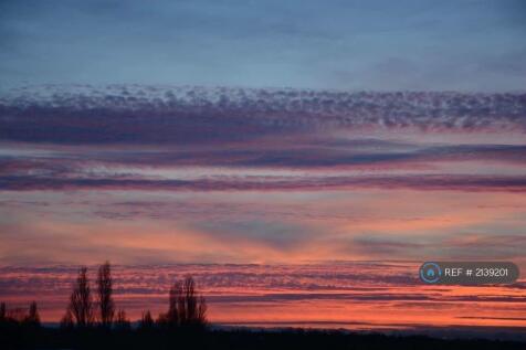 Sunset From The Balcony