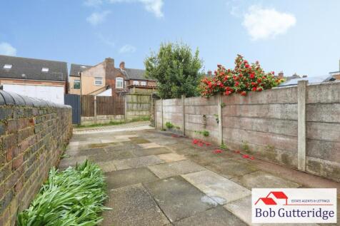 REAR YARD / PARKING AREA
