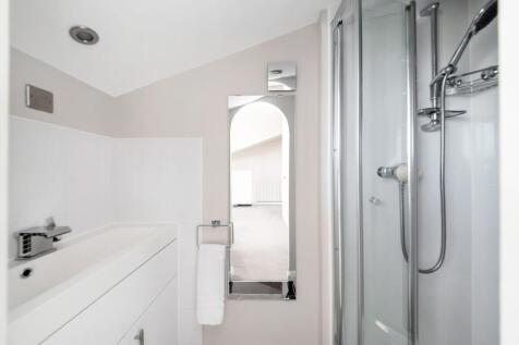 BEDROOM FOUR EN-SUITE SHOWER AREA