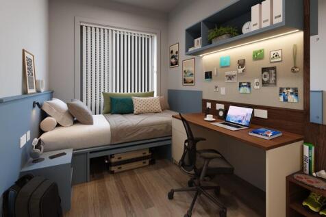 Well-appointed single bedroom with a built-in d...