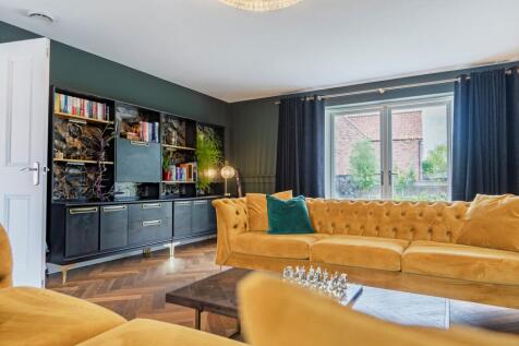 Herringbone flooring and glazed patio doors