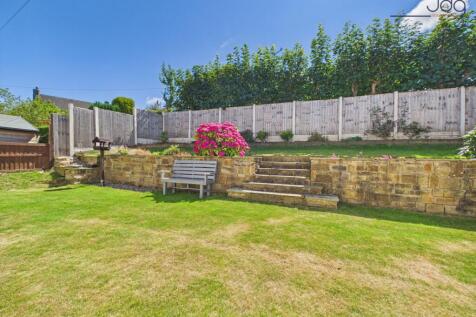 Generous Tiered Garden with Mature Planting