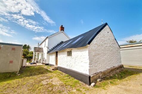 Stone Outbuilding and main house