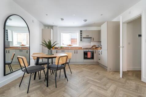 An open plan kitchen-dining area