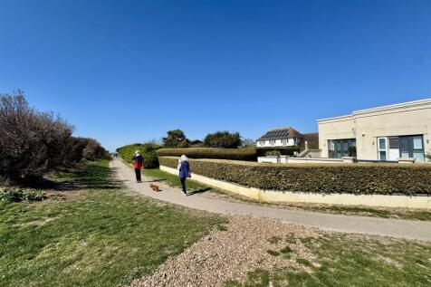 THE BEACH AND SURROUNDINGS