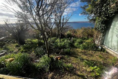 Front garden sea view from Crimmond, Penrioch