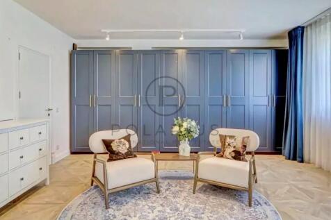 Elegant living room with stylish blue wall-to-wall