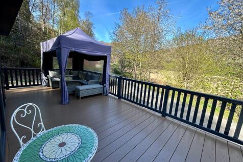 Exterior Wraparound Decking With Countryside Views