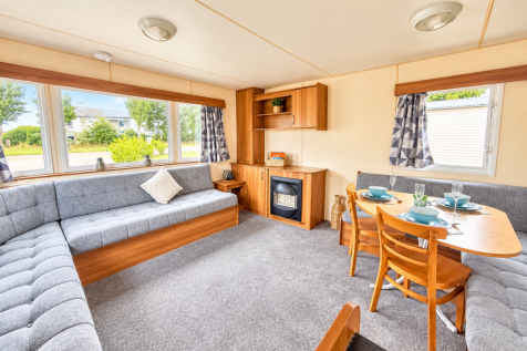 Spacious Open Plan Living Area With L Shaped Sofa,