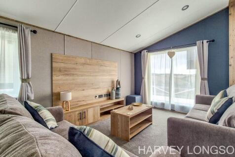 Comfortable lounge with large windows and modern f