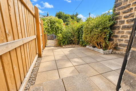 Sunny Patio Garden with Gate 17