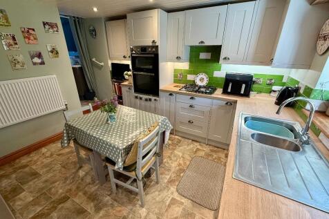 Country kitchen, through to utility area