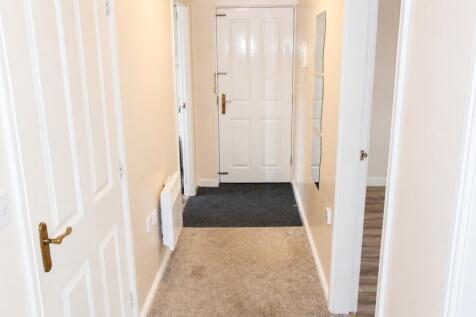 Bright and tidy entrance with neutral tones...