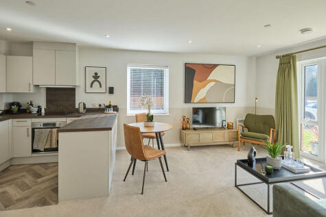 a kitchen with a dining table