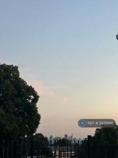 Sunset And City View