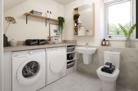 Large cloakroom with utility area for the washing machine