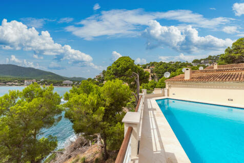 Community pool with sea views
