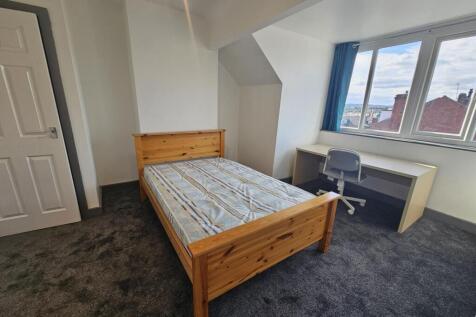 Bright and inviting master bedroom featuring a ...