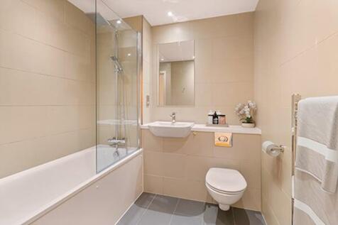 Experience luxury in this contemporary bathroom, blending style with functionality.